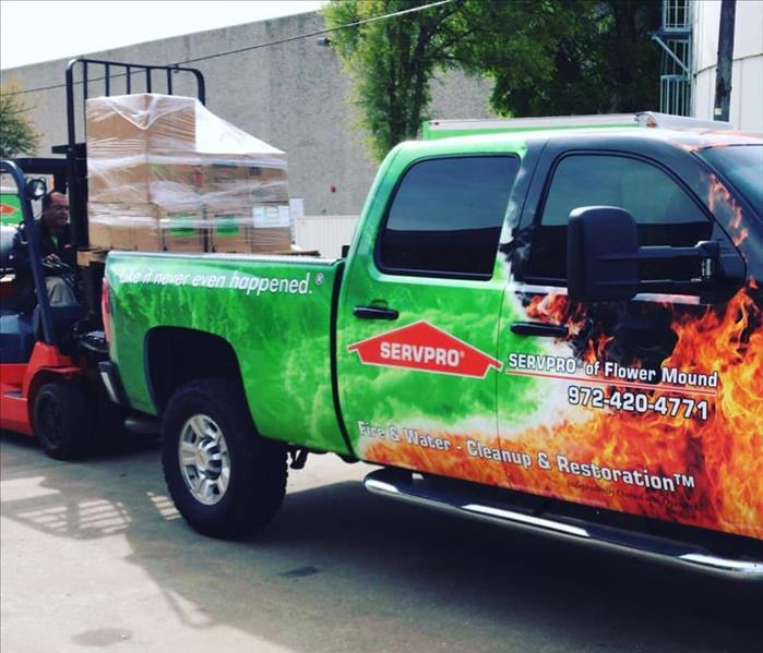 SERVPRO truck with fire and flames painted on the side