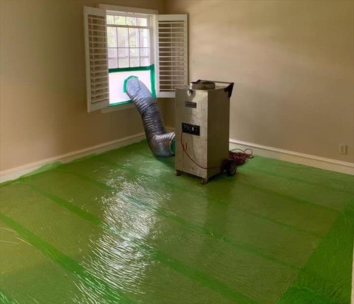 green plastic covering floor